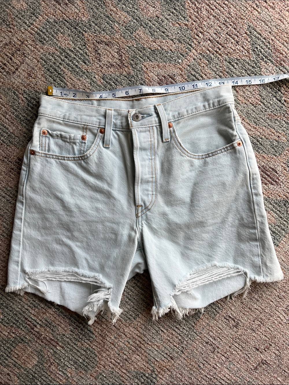 Levi's pale blue distressed high-rise jean shorts